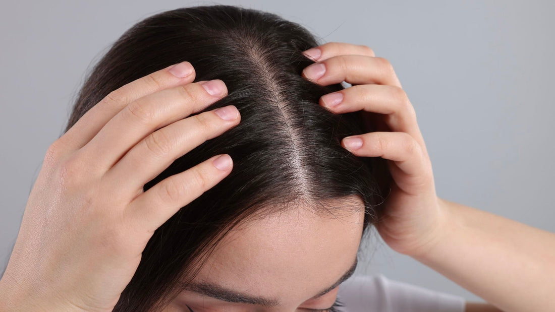 Woman with itchy scalp