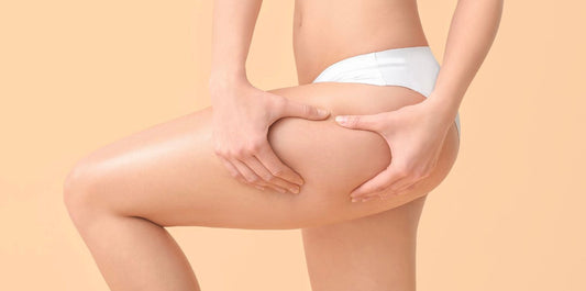 Women squeezing thigh body positivity image