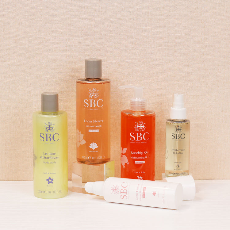 Various products from SBC Skincare's Menopause category on a peach background