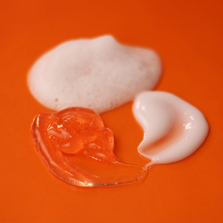 Product swatches on a bright orange background 